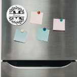 Aimant Modern Black Floral Wreath Split Monogram "M"<br><div class="desc">This refined floral split monogram wreath design features a delicate botanical arrangement forming a graceful circular frame around a customizable monogram "M". The balanced composition highlights elegant leaves and floral accents that create a timeless and sophisticated look. This magnet is perfect for personalized gifts, wedding favors, home accessories, this design...</div>