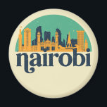 Aimant Nairobi Kenya City Skyline Retro Cityscape Art<br><div class="desc">Design urbain vintage et rétro avec une belle skyline, attraction touristique et art urbain. gratte-ciel Cool et silhouette de construction merchandises pour touristes et voyageurs. Parfait comme souvenir à rapporter à la maison lorsque vous voyagez dans le monde entier. Enregistrez la mémoire de votre voyage et de vos vacances en...</div>