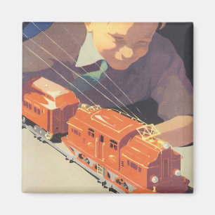 Aimant Noël vintage, garçon jouant avec des trains jouets