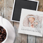 Aimant Notre premier Noël en grands-parents Moderne Chic<br><div class="desc">Design est composé de typographie chic moderne avec sans serif et serif police. Ajoutez une photo personnalisée du bébé et de l'année.</div>