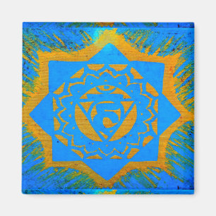 Aimant or sur symbole tantrique bleu