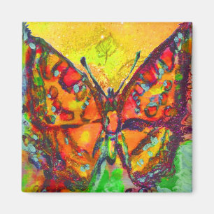 AIMANT PAPILLON ROUGE DANS DES ÉTINCELLES DE JAUNE D'OR