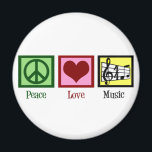 Aimant Peace Love Music<br><div class="desc">Beau cadeau musicien avec un signe de paix,  le coeur,  et une clé trible et le personnel musical. Cool PEACE LOVE MUSIC Noël présent pour un compositeur,  un directeur de groupe ou un chef de choeur.</div>