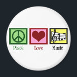 Aimant Peace Love Music<br><div class="desc">Beau cadeau musicien avec un signe de paix, le coeur, et une clé trible et le personnel musical. Cool PEACE LOVE MUSIC Noël présent pour un compositeur, un directeur de groupe ou un chef de choeur.</div>