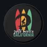 Aimant Père Noël Monica Beach California Retro Surfing<br><div class="desc">Design rétro vintage pour les surfeurs qui aiment surfer et surfer sur les vagues de l'océan. Vacances d'été cool, vacances de printemps marchandises pour ceux qui aiment le soleil chaud, le temps tropical, bronzage sous le palmier. Un design grandiose et déprimé à porter tout en profitant de la fête de...</div>