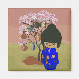 Aimant Poupée mignonne de kokeshi avec l'arbre de fleurs