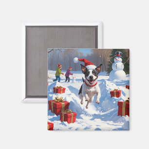 Aimant Rat Terrier courant dans la neige avec un chapeau