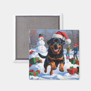 Aimant Rottweiler courant dans la neige avec un chapeau d