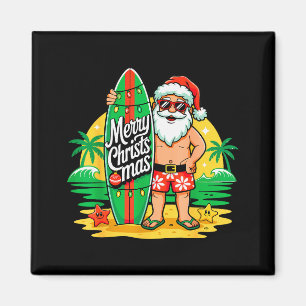 Aimant Santa surfant sur la plage hawaïenne Noël en juill