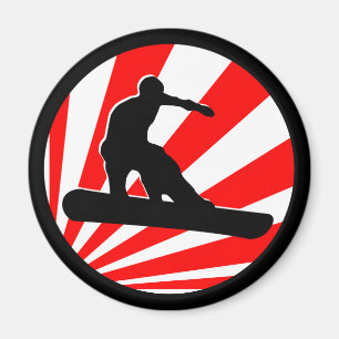 Aimant snowboard. rayons rouges.