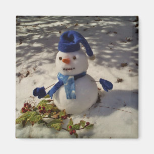 Aimant Snowman avec casquette bleu, gants et écharpe