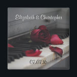 Aimant Touches de piano avec Mariage de rose rouge<br><div class="desc">Photo artistique d'un vieux piano se concentrant sur les vieilles clés jaunes avec une rose rouge défraîchie assise sur les clés et quelques pétales lâches éparpillés. Cette image a une humeur quelque peu mélancolique et sentimentale avec un peu de nostalgie. Customisez avec le nom de la mariée et des mariés...</div>