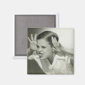 Aimant Un garçon qui fait son visage (Recto/Verso)