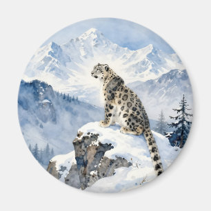 Aimant Un léopard des neiges sur un pic enneigé