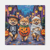 Aimant Un Pomeranian faisant Trick-or-Treating dans des c (Devant)