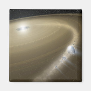 Aimant Une comète étant déchirée aux lambeaux autour