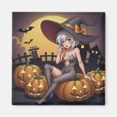 Aimant Une sorcière d'Halloween aux yeux verts sur Jack-O (Devant)