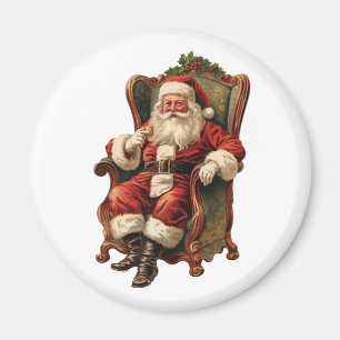 Aimant Vintage Père Noël assis en fauteuil confortable No