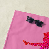 AIME DANSER serviette de plage en rose. (En situation)