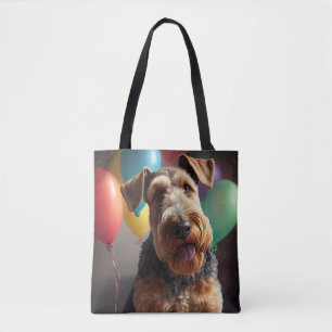 Airedale-hond met cake en ballonnen draagtas