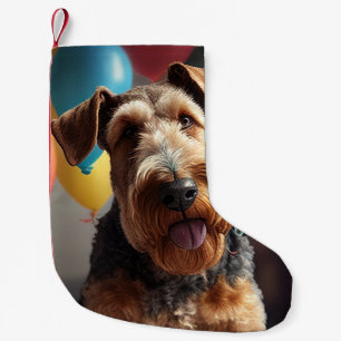 Airedale-hond met cake en ballonnen kleine kerstsok