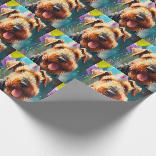 Airedale hond met verjaardagscadeau en pet cadeaupapier (Hoek)