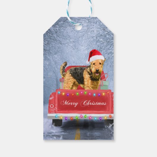 Airedale Terrier Dog in Snow, met Kerstmis Cadeaulabel (Achterkant)