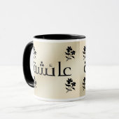 Aisha in de Arabische beige in de zwarte Mok (Voorkant links)