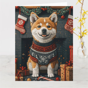Akita-hond met kerstcadeaus bij de open haard kaart