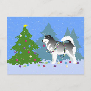 Alaskan Malamute die kerstboom decorreert Feestdagenkaart