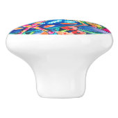 Alice et le bouton en céramique de Caterpillar (Côté)