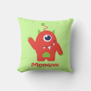 Alien aux yeux orange et vert nom enfant coussin