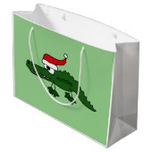 Alligator drôle dans le sac de cadeau de Noël de (Dos Angle)
