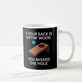 Als je zak tegen het hout slaat, heb je het gat ge koffiemok