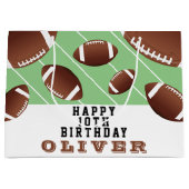 Amerikaans Football valt rond Groot Cadeauzakje (Voorkant)