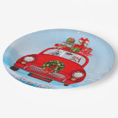 Amerikaanse eskimo-hond in auto's met kerstbedekki papieren bordje (Gekanteld)