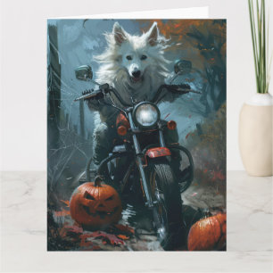 Amerikaanse Eskimo rijdt op motorfiets Halloween g Kaart