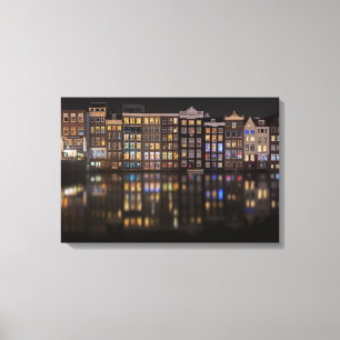Amsterdam huizen met kleurrijke lichten 's nachts canvas afdruk