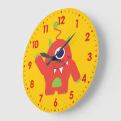 Amusants enfants alien orange et jaune horloge mur (Angle)