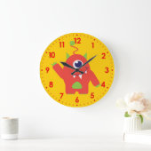 Amusants enfants alien orange et jaune horloge mur (Maison)