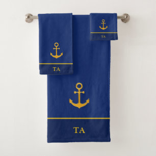 Ancre dorée et monogramme sur fond bleu marine