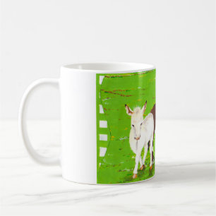 Âne Brown et tasse blanche d'âne