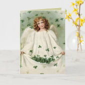 Ange avec la carte du jour de St Patrick de trèfle (Fleur jaune)