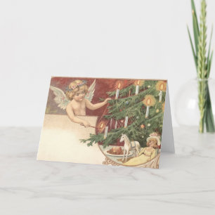 Angel allumant la carte Vintage des bougies de Noë