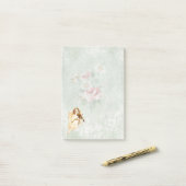 Angel die een Violin speelt op achtergrond Post-it® Notes (Op bureau)