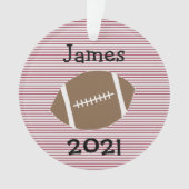 Année de football de garçon dans l'ornement de rév (devant)