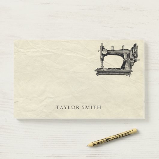 Antiek naaimachine met naam post-it® notes (Op bureau)