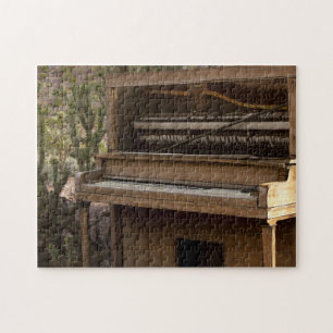 Antiek Piano in woestijn Legpuzzel