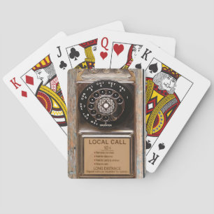 Antiek telefoontoestel met mobiele telefoon robuus pokerkaarten