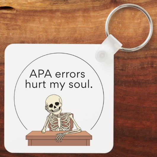 APA Errors - Keychain (Achterkant)